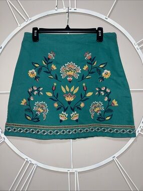 Francesca’s Miami Teal Mini Skirt with Multicolor Floral Embroidery